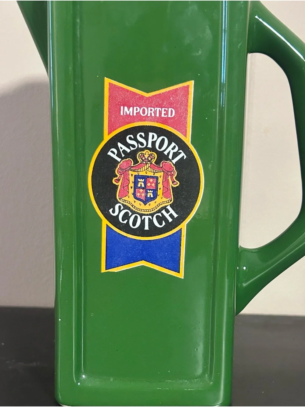 Passport Green Ceramic Pitcher with Multicolor Label